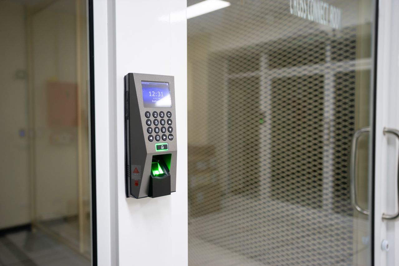 Mastering the First Impression: Your intriguing post title goes here A modern fingerprint scanner for secure access control in an office environment.